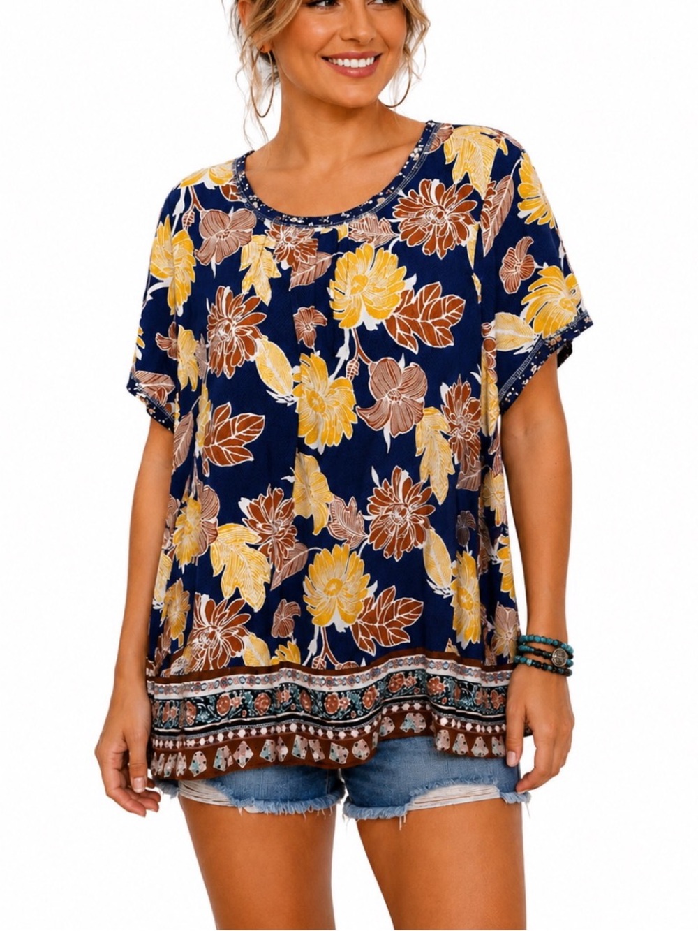 Oddy boho-style women’s top featuring a navy background & floral print